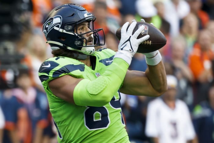 Seattle Seahawks tight end Colby Parkinson (84) catches a touchdown pass against the Denver Broncos during the second quarter at Lumen Field.